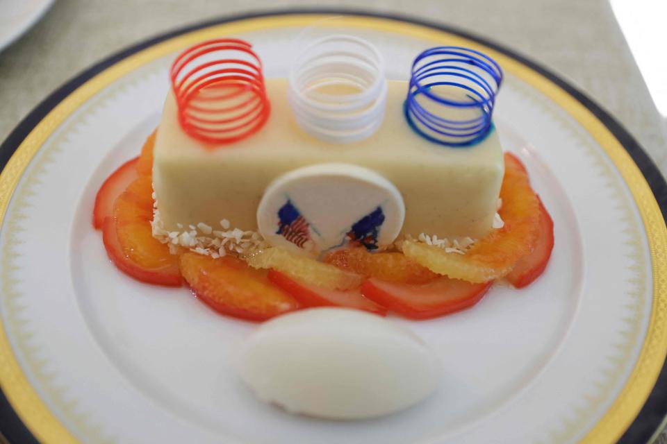 The dessert for the White House state dinner for France was orange chiffon cake with roasted pears, citrus sauce and creme fraiche ice cream.