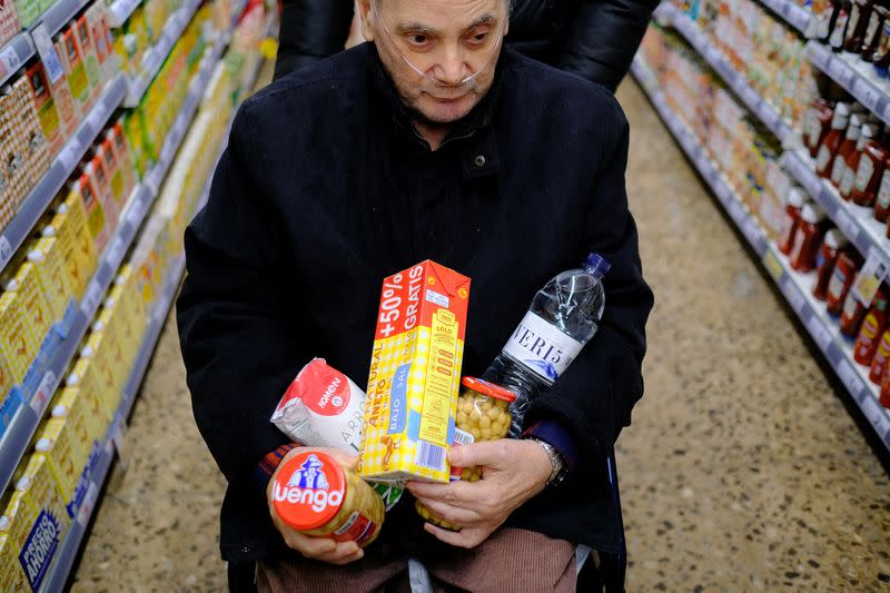 The Wider Image: High power prices drive some patients in Spain into poverty