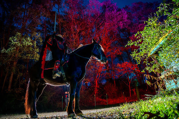 The headless horseman awaits his next victims at "Headless Horseman Haunted Attractions"