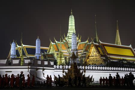 The Great Victory Royal Chariot is pulled by Thai army officials dressed in ancient uniforms in preparation for the Royal Cremation ceremony. REUTERS/Athit Perawongmetha