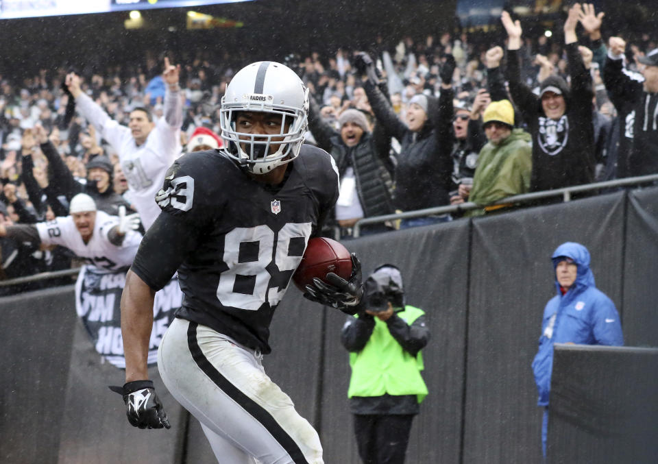 Oakland Raiders wide receiver Amari Cooper (89) runs into the end zone on a 26-yard touchdown reception against the Green Bay Packers during an NFL football game, Sunday, Dec. 20, 2015, in Oakland, Calif. (AP Photo/Ryan Kang)