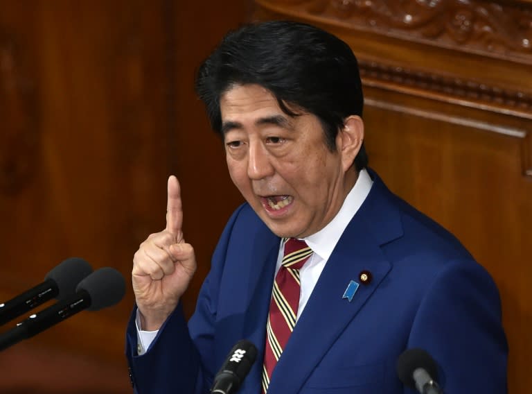 A legislator from the party of Prime Minister Shinzo Abe (pictured) said Barack Obama carried the "blood of ... slaves"