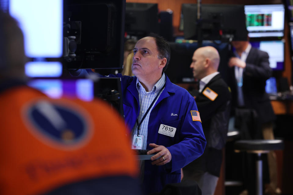 NEW YORK, NEW YORK - MARCH 08: Traders work on the floor of the New York Stock Exchange (NYSE) on March 08, 2022 in New York City. The Dow was up slightly in morning trading as the Russian invasion of Ukraine continues to unsettle global markets. (Photo by Spencer Platt/Getty Images)