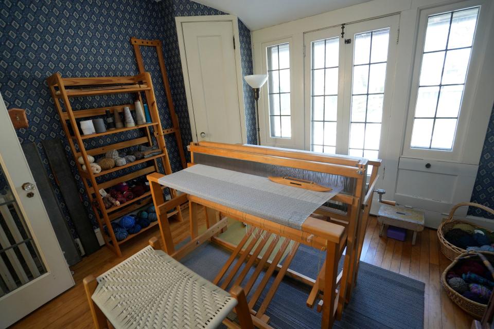 The loom room, actually a repurposed bedroom, is shown at Sarah Frecska's home. She weaves such items as table runners, blankets and scarves.