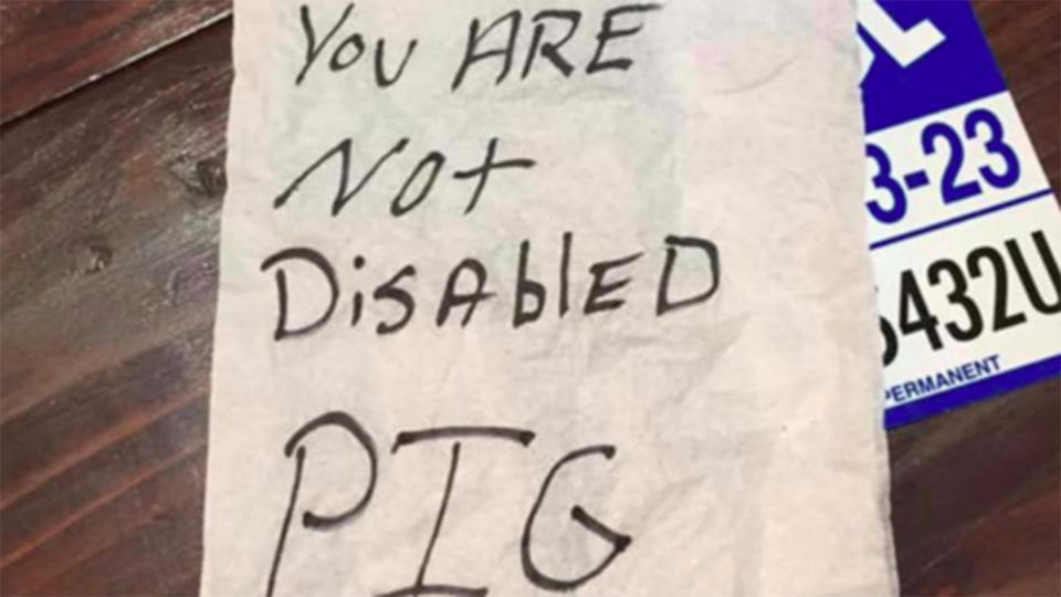 A disabled woman parked in a handicapped spot outside a store returned to her car to find scratches on the hood and a nasty note. Source: Facebook/Jeff Paolella