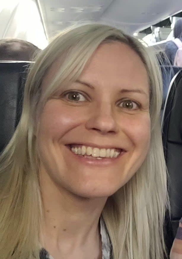 Julia MacIsaac, 42, of Toronto, was found with 'obvious signs of trauma' on Thursday in a townhouse in the area of Scarborough Golf Club Road and Kingston Road. She was pronounced dead at the scene. A 43-year-old man has been charged with first-degree murder in her death. (Submitted by Toronto Police Service - image credit)