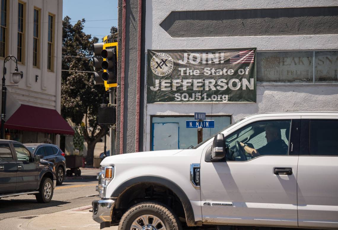 A sign calling for supporters for the State of Jefferson hangs on a building at the intersection of North Main and West Miner streets in Yreka in August. 