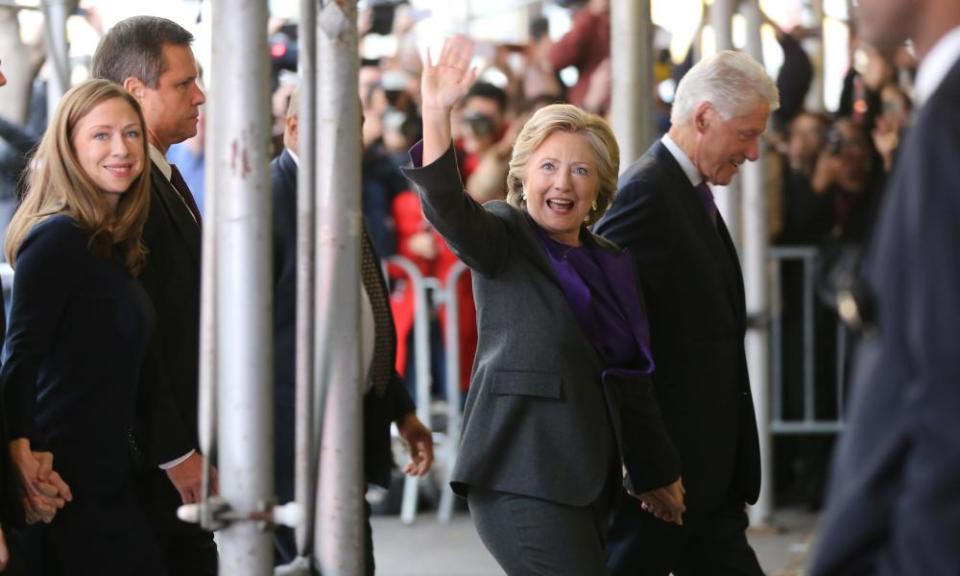 Hillary Clinton waves to a crowd as she arrives to speak to her staff and supporters after losing the race for the White House.