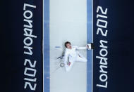 Bartosz Piasecki of Norway celebrates victory against Jinsun Jung of Korea in the Men's Epee Individual Fencing Semi Final on Day 5 of the London 2012 Olympic Games at ExCeL on August 1, 2012 in London, England. (Photo by Ian Walton/Getty Images)