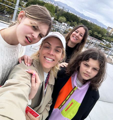 <p>Busy Philipps/Instagram</p> Busy Philipps and a friend pose with her with daughters Birdie and Cricket,
