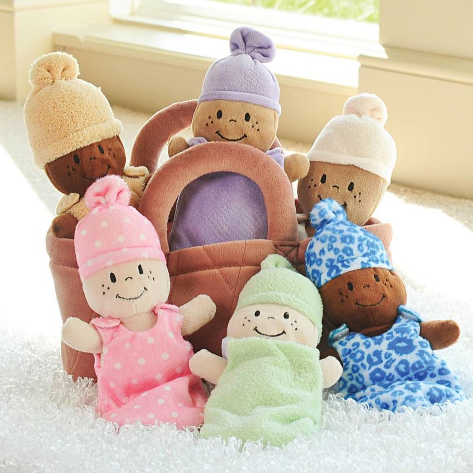 U.S. Toy ‘s “Basket of Babies” is a set of six multicultural dolls in a soft fabric basket.