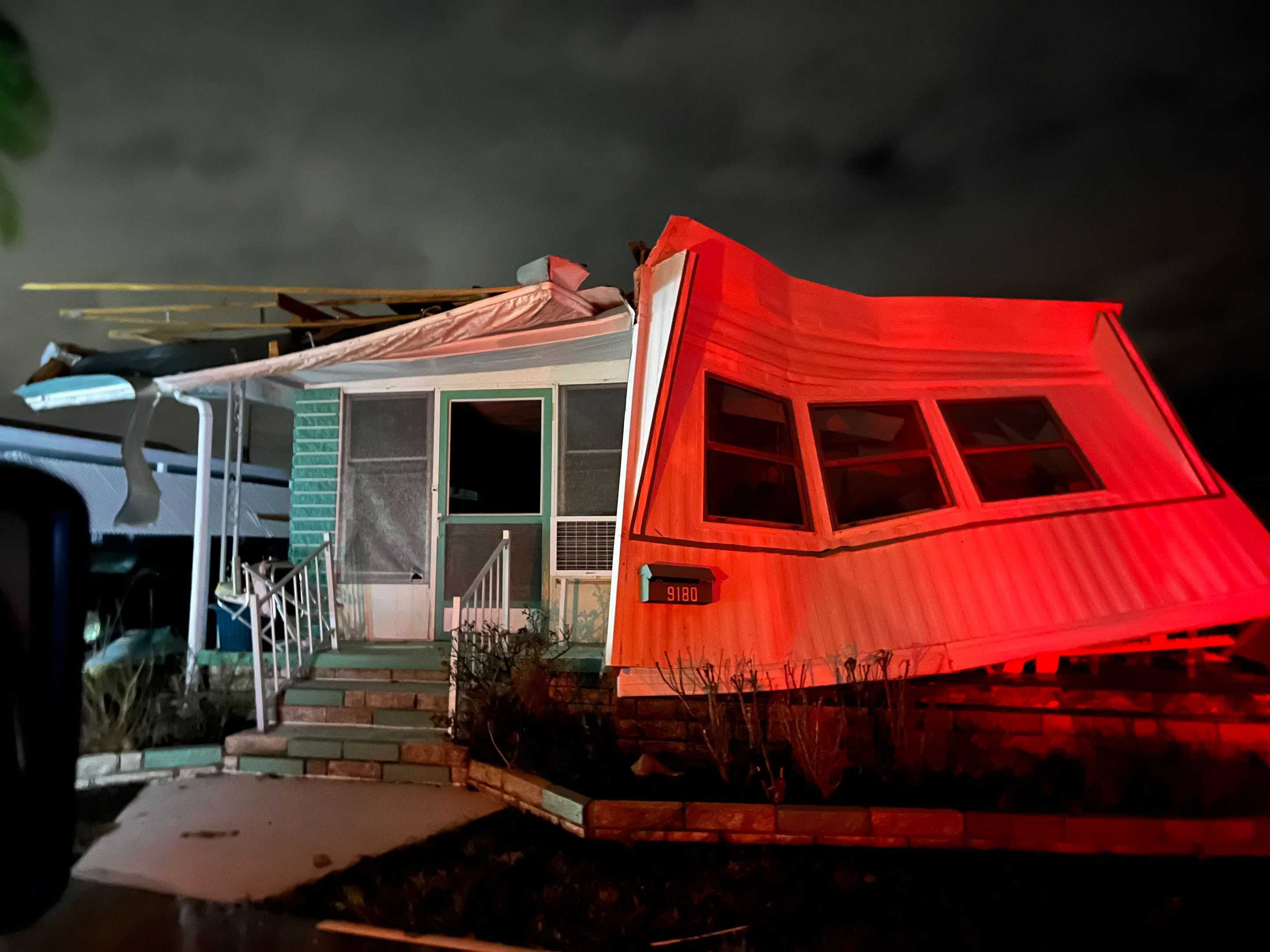 Damage to a mobile home at Harbor Lights Club, a mobile home park on Long Bayou in St. Petersburg, Florida.