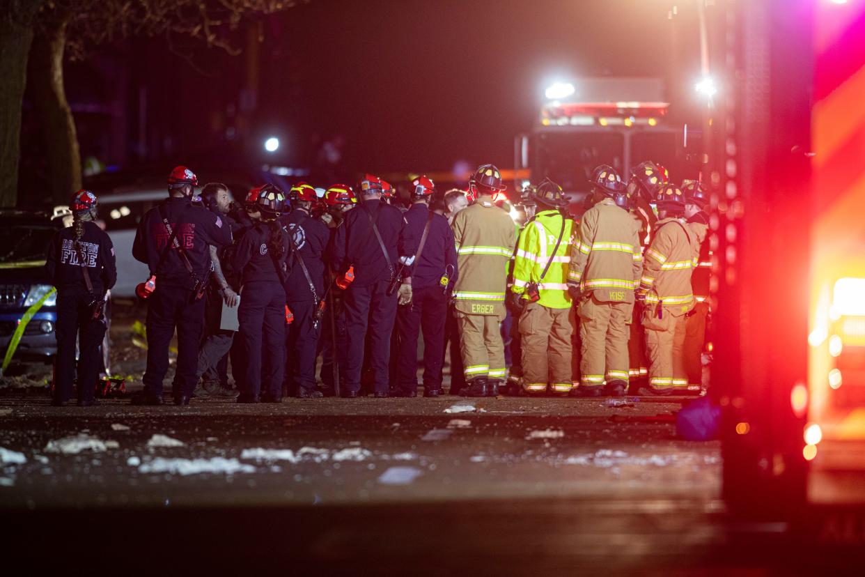 First responders gather outside the Apollo Theatre in Belvidere on Friday, March 31, 2023, after rescuing dozens of people from insider. The roof collapsed during a concert crushing and trapping people. One person died.