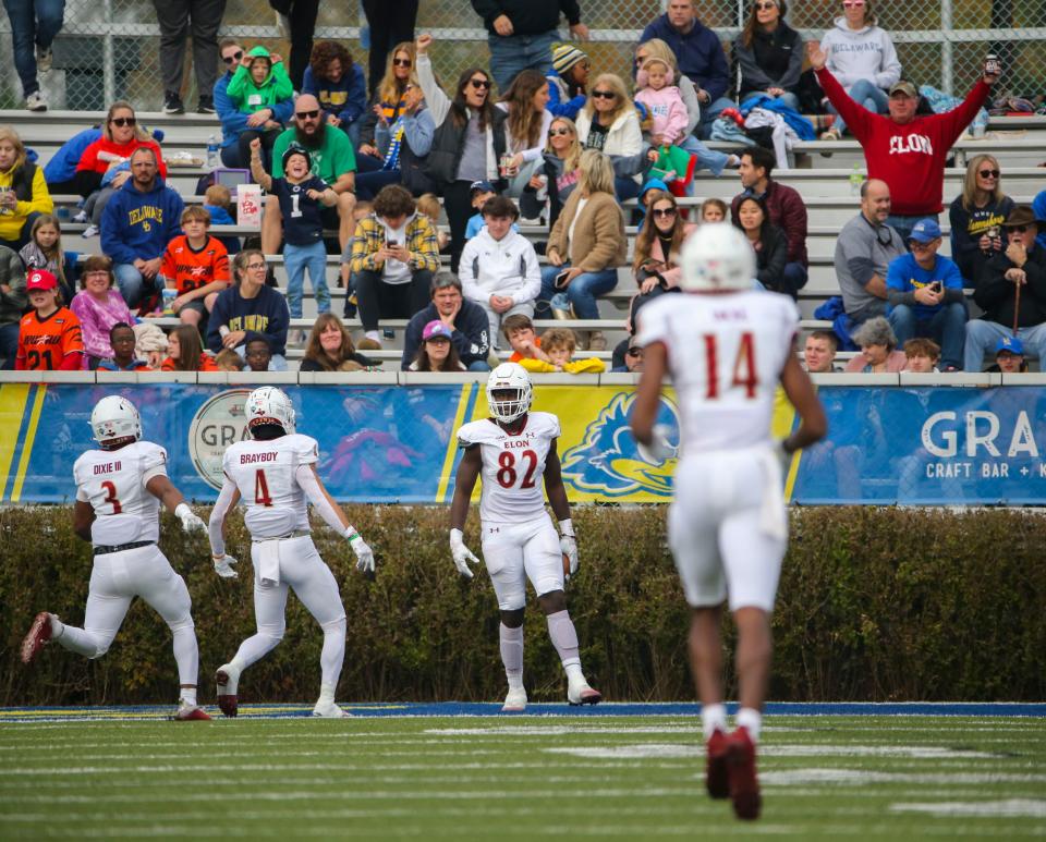 Elon tight end Johncarlos Miller II (82) pulls up in the end zone after scoring on a long pass reception in the second quarter to give the Phoenix a 20-13 lead over the Blue Hens at Delaware Stadium, Saturday, Nov. 4, 2023.