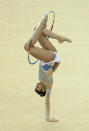 LONDON, ENGLAND - JANUARY 16: Varvara Filiou of Greece in action in the Individual All-Around during the FIG Rhythmic Gymnastics Olympic Qualification round at North Greenwich Arena on January 16, 2012 in London, England. (Photo by Ian Walton/Getty Images)