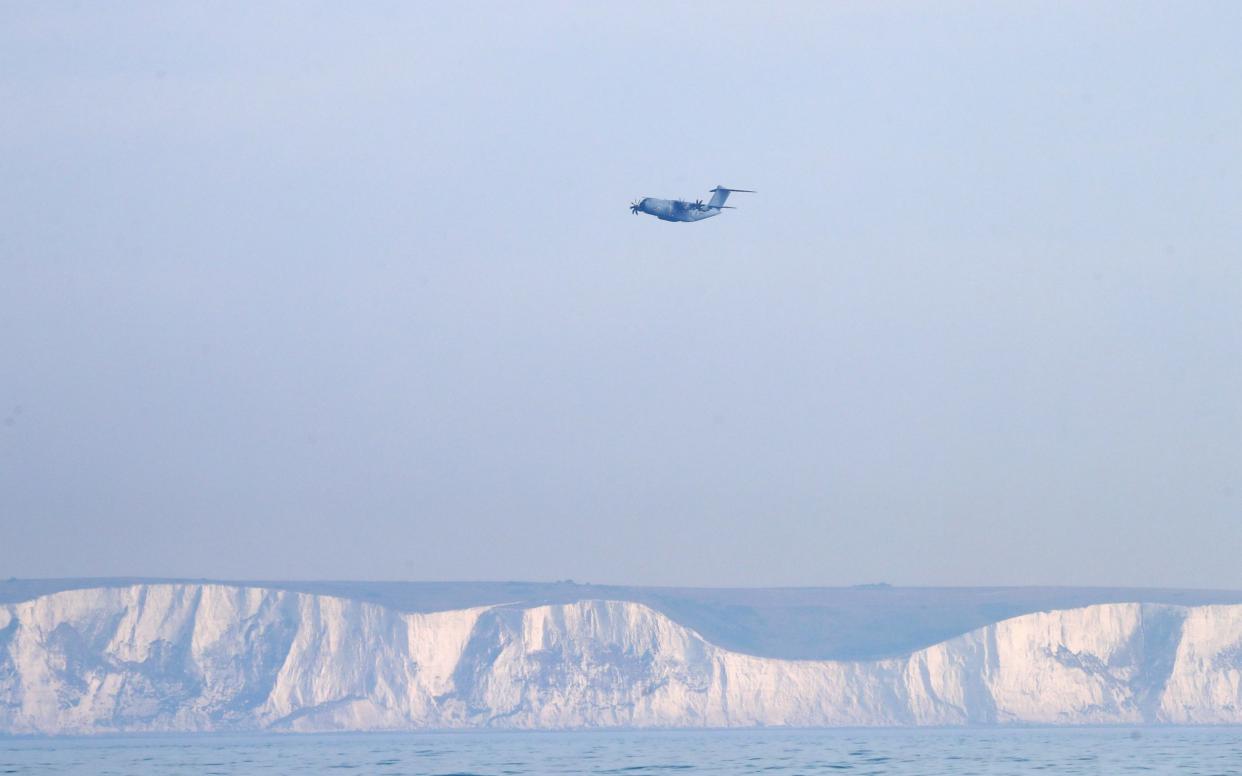 a Royal Air Force Atlas A400M aeroplane in the skies above Dover in Kent which has provided aerial surveillance as part of an "initial offer of assistance" from the Ministry of Defence to the Home Office - PA