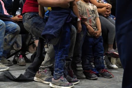 Asylum-seekers at the Donna Soft-Sided Processing Facility in Donna, Texas