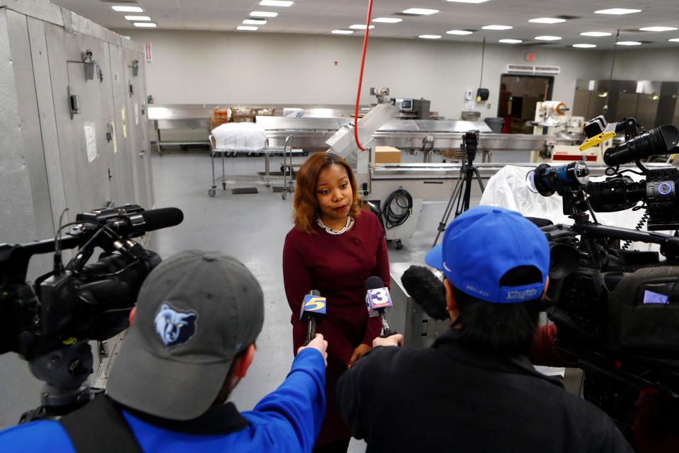 Jerica Phillips, spokesperson for Shelby County Schools, speaks with the media from their Central Nutrition Center warehouse on Wednesday, March 18, 2020.