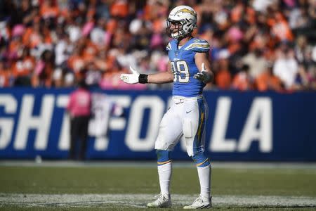 FILE PHOTO: Oct 22, 2017; Carson, CA, USA; Los Angeles Chargers defensive end Joey Bosa (99) reacts after sacking Denver Broncos quarterback Trevor Siemian (13) during the second half at StubHub Center. Mandatory Credit: Kelvin Kuo-USA TODAY Sports/File Photo