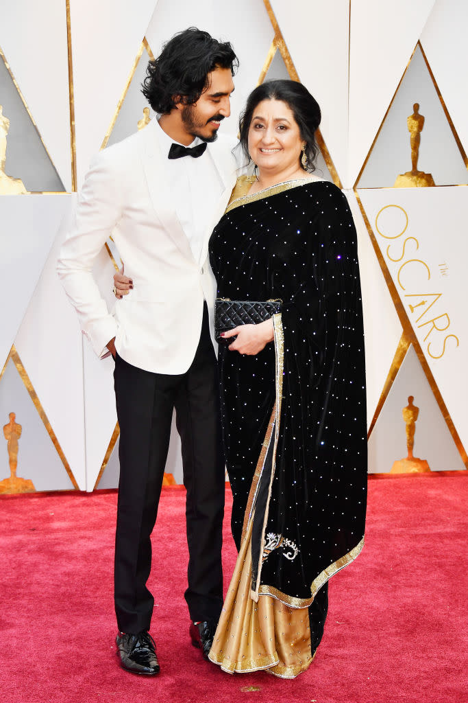 Dev Patel and his mom, Anita Patel. (Photo: Getty Images)