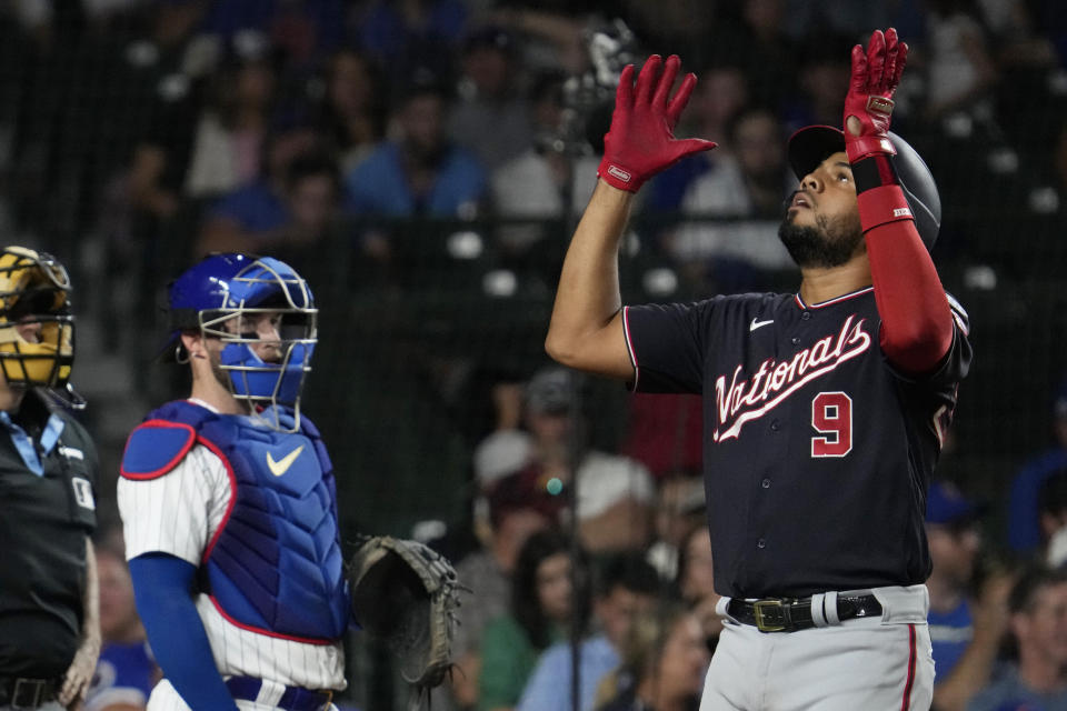 Washington Nationals' Jeimer Candelario celebrates after hitting a solo home run during the eighth inning of a baseball game against the Chicago Cubs in Chicago, Wednesday, July 19, 2023. (AP Photo/Nam Y. Huh)