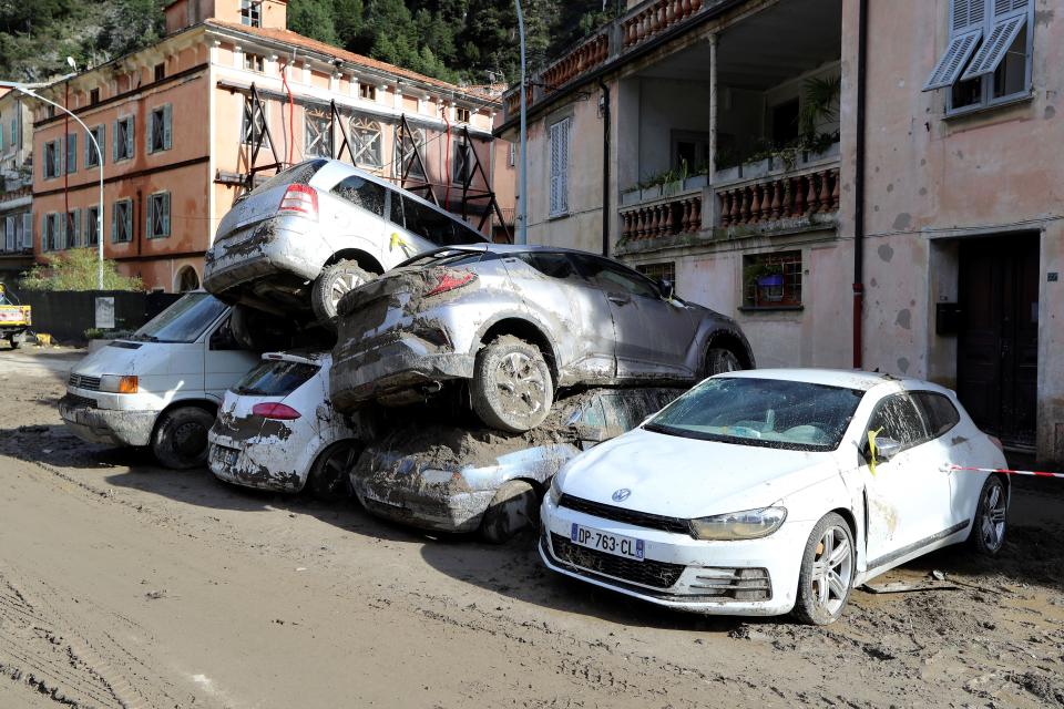 Cars lie piled on top of each other after Storm Alex battered Breil-sur-Roya, southern France.