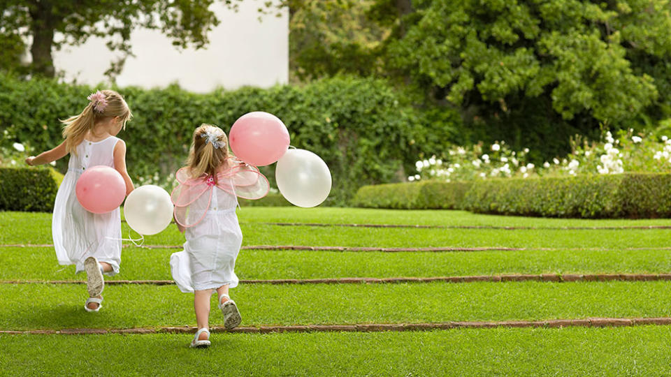 Kids playing with balloons 