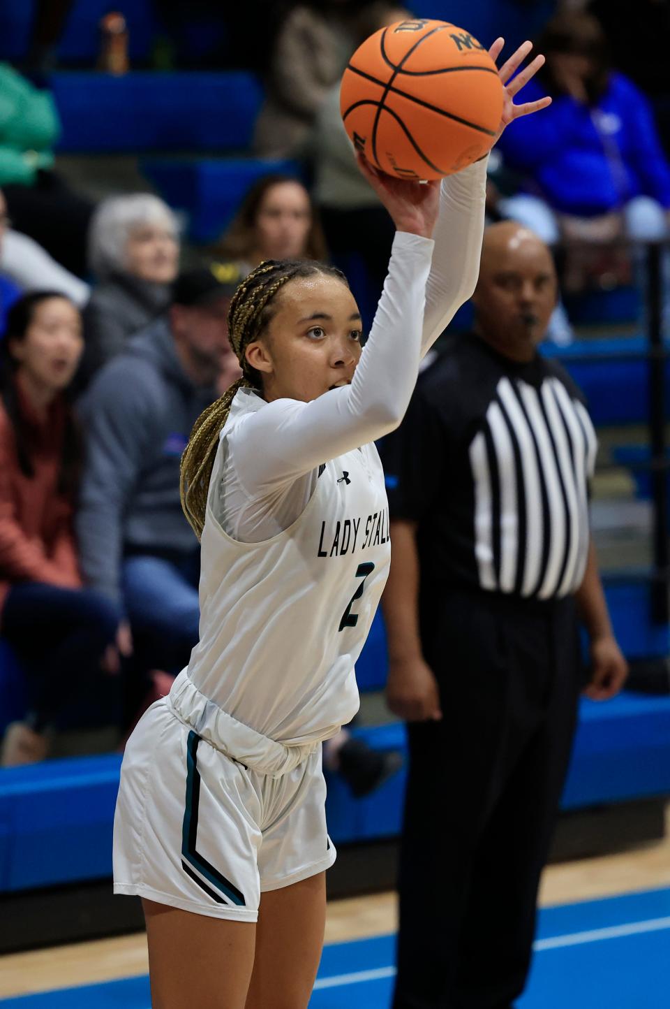 Providence's Janai Jordan (2) shoots a 3-point basket during the fourth quarter on Friday against Tocoi Creek.