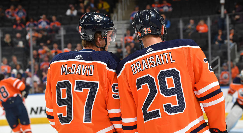 EDMONTON, AB - OCTOBER 16:  Connor McDavid #97 and Leon Draisaitl #29 of the Edmonton Oilers warm up prior to the game against the Philadelphia Flyers on October 16, 2019, at Rogers Place in Edmonton, Alberta, Canada. (Photo by Andy Devlin/NHLI via Getty Images)