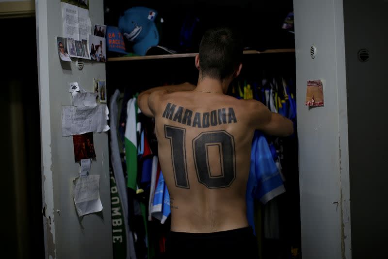 The Wider Image: Argentines celebrate 'eternal love' for Maradona with tattoos