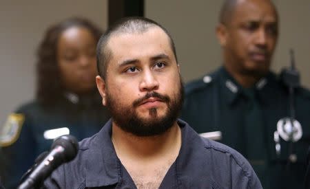 George Zimmerman listens to the judge during his first-appearance hearing in Sanford, Florida November 19, 2013. REUTERS/Joe Burbank/Orlando Sentinel/Pool