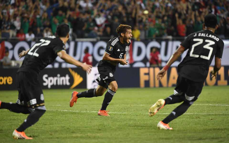 Jul 7, 2019; Chicago, IL, USA; Mexico midfielder Jonathan Dos Santos (6) celebrates after scoring a goal against the United States in the second half championship match of the CONCACAF Gold Cup soccer tournament at Soldier Field. Mandatory Credit: Mike DiNovo-USA TODAY Sports