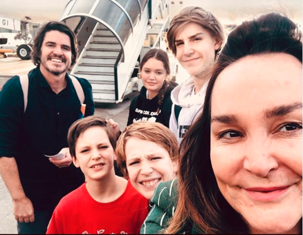 Kate Lagebroek's family about to get on a plane to Italy