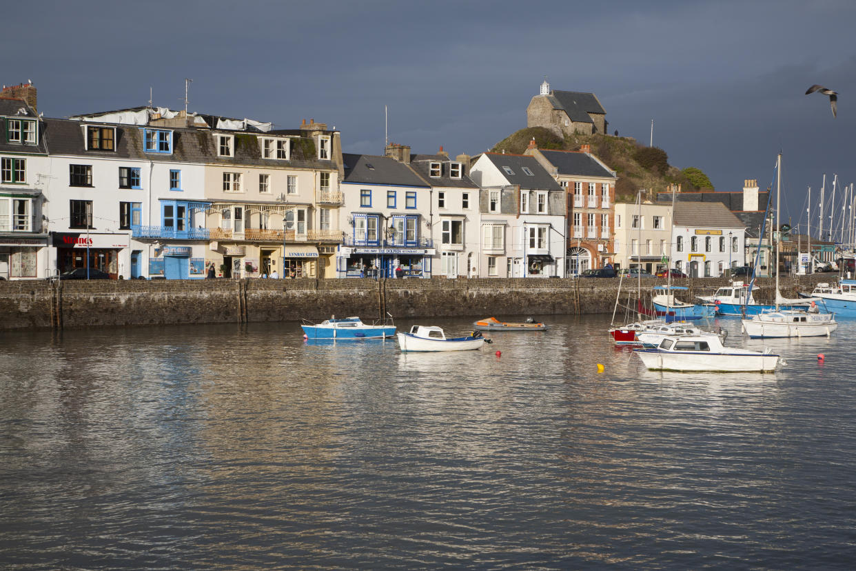 View of boats in the harbour in sunshine of winter afternoon, Ilfracombe, north Devon, England (Photo by: Education Images/Universal Images Group via Getty Images)