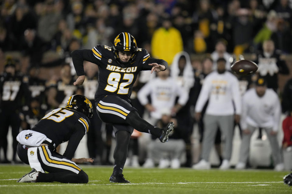 Missouri place-kicker Harrison Mevis (92) makes a 30-yard field goal with seconds left in the second half of an NCAA college football game against Florida Saturday, Nov. 18, 2023, in Columbia, Mo. Missouri won 33-31. (AP Photo/Jeff Roberson)