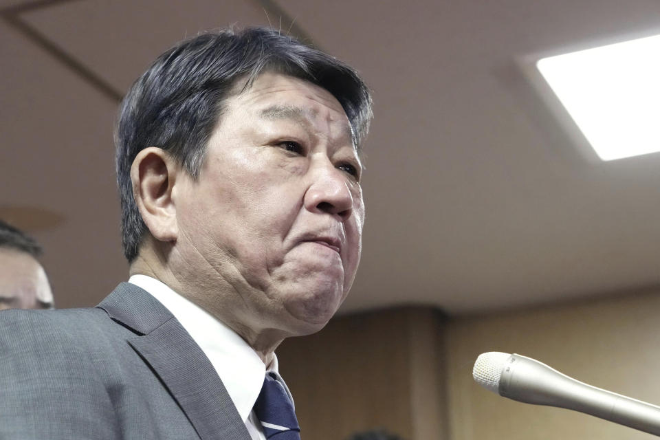 Japan's governing party, Liberal Democratic Party’s Secretary General Toshimitsu Motegi speak to reporters at the party's headquarters in Tokyo Sunday, April 28, 2024. Japan’s governing party, stung by an extensive slush funds scandal, lost all three seats in parliamentary by-elections Sunday in a major setback for Prime Minister Fumio Kishida in seeking reelection as his party's leader in the autumn. (Kyodo News via AP)