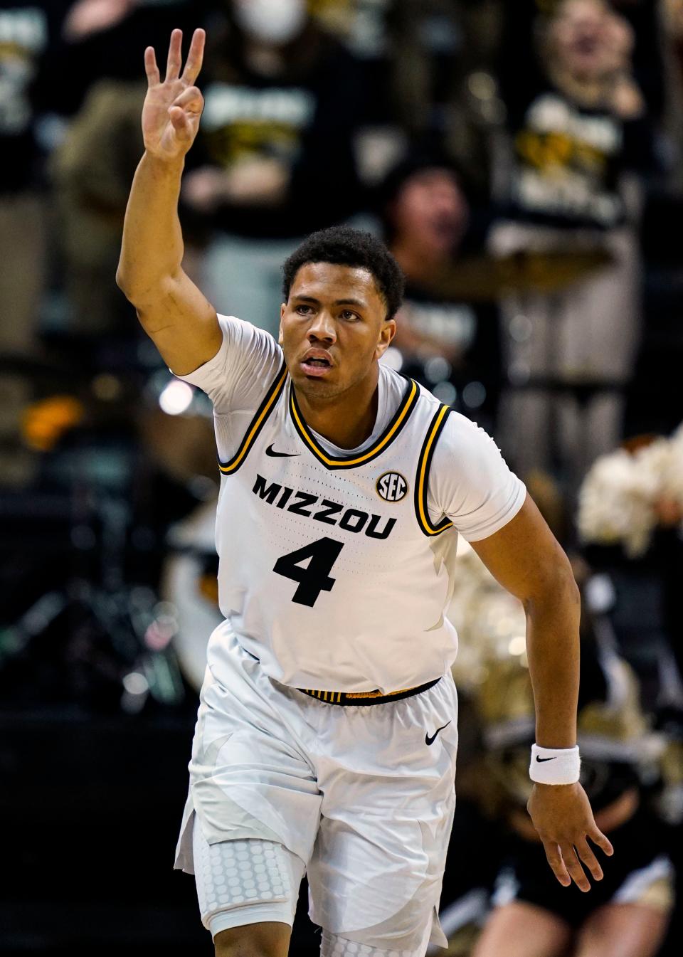 Missouri guard Javon Pickett (4) celebrates after scoring against Auburn on Tuesday at Mizzou Arena.