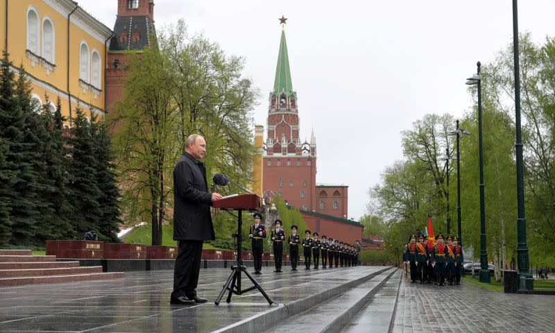 Russian President Vladimir Putin makes an address near the Tomb of the Unknown Soldier on Victory Day in central Moscow