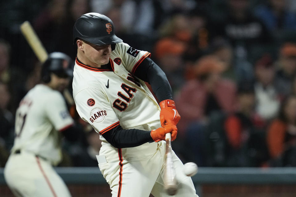 San Francisco Giants’ Matt Chapman hits a solo home run during the fourth inning of a baseball game against the Milwaukee Brewers, Wednesday, Sept. 11, 2024, in San Francisco. (AP Photo/Godofredo A. Vásquez)