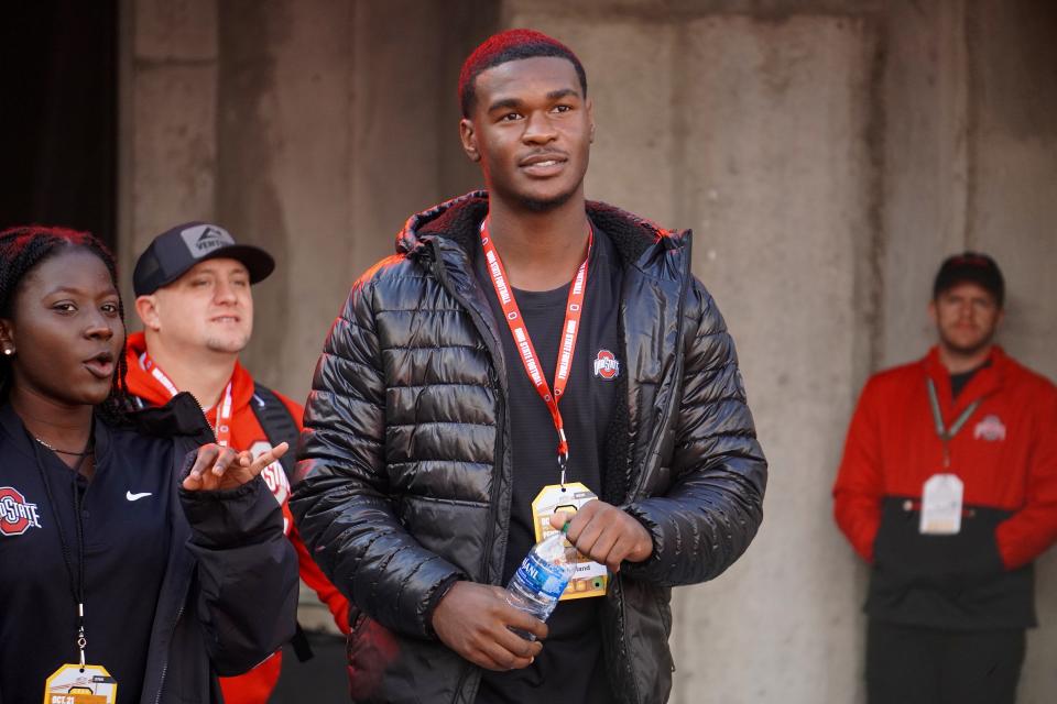 Recruit Air Noland watches Ohio State warm up before playing Penn State Oct. 21, 2023 at Ohio Stadium.