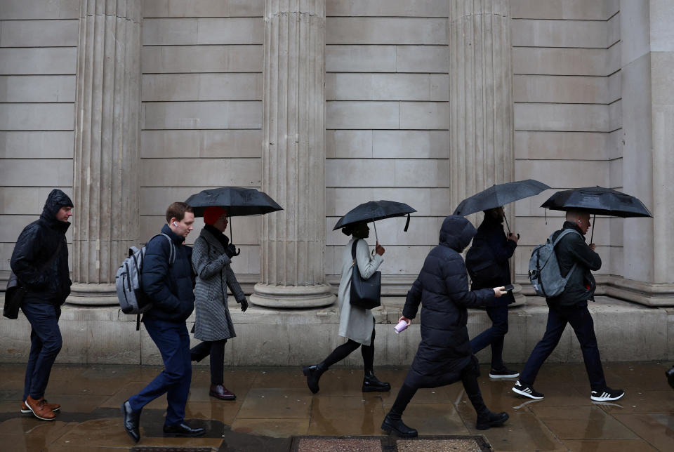 jobs FILE PHOTO: Commuters walk during the morning rush hour near the Bank of England in the City of London financial district in London, Britain, February 8, 2024. REUTERS/Toby Melville/File Photo