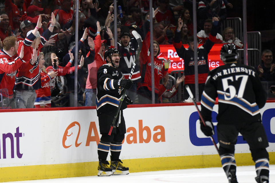 Washington Capitals left wing Alex Ovechkin (8) celebrates after his goal during the second period of an NHL hockey game against the Arizona Coyotes, Saturday, Nov. 5, 2022, in Washington. (AP Photo/Nick Wass)