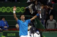 Tennis - Qatar Open - Men's Singles - Novak Djokovic of Serbia v Radek Stepanek of Czech Republic - Doha, Qatar - 5/1/2017 - Djokovic celebrates after winning. REUTERS/Ibraheem Al Omari