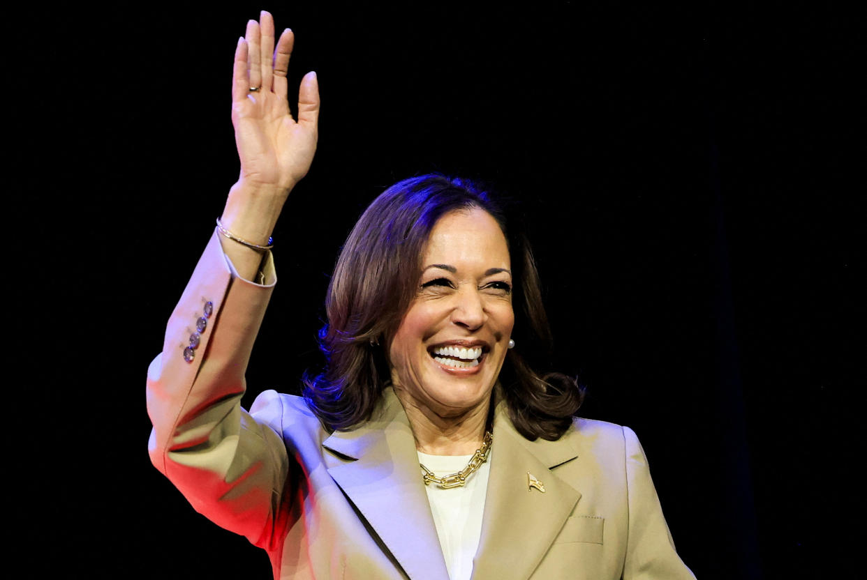 Vice President Kamala Harris waves as she attends a town hall in Philadelphia on July 13. (Kevin Mohatt/Reuters)