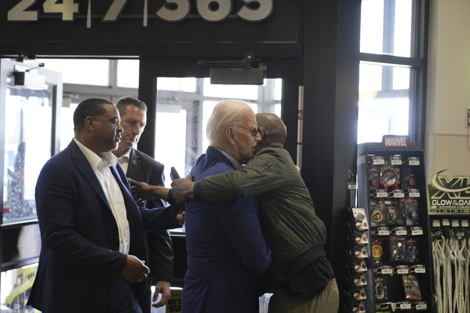 President Joe Biden is greeted after walking into a Sheetz after stopping enroute to Pittsburgh International Airport, Wednesday, April 17, 2024, in Pittsburgh, Pa. (AP Photo/Alex Brandon))