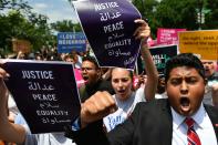 <p>People protest the Muslim travel ban outside of the US Supreme Court in Washington, D.C. on June 26, 2018. (Photo: Mandel Ngan/AFP/Getty Images) </p>