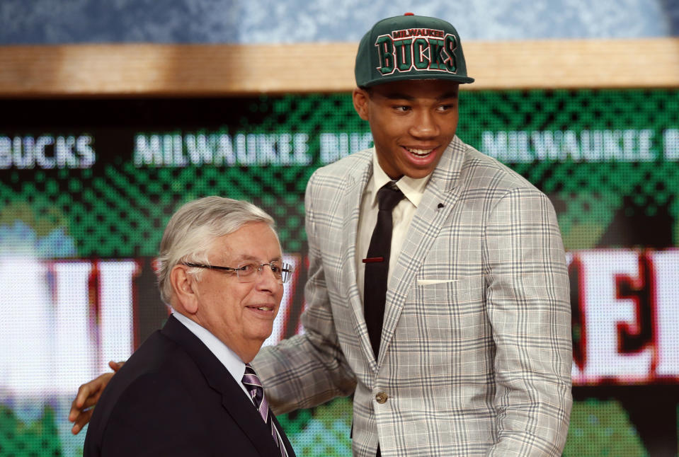 Giannis Antetokounmpo (R) from Greece stands with NBA commissioner David Stern after being selected by the Milwaukee Bucks as the 15th overall pick in the 2013 NBA draft. (Reuters)