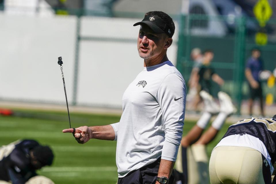 New Orleans Saints' head coach Dennis Allen watches a drill before an NFL football joint practice session with the Green Bay Packers Tuesday, Aug. 16, 2022, in Green Bay, Wis. (AP Photo/Morry Gash)