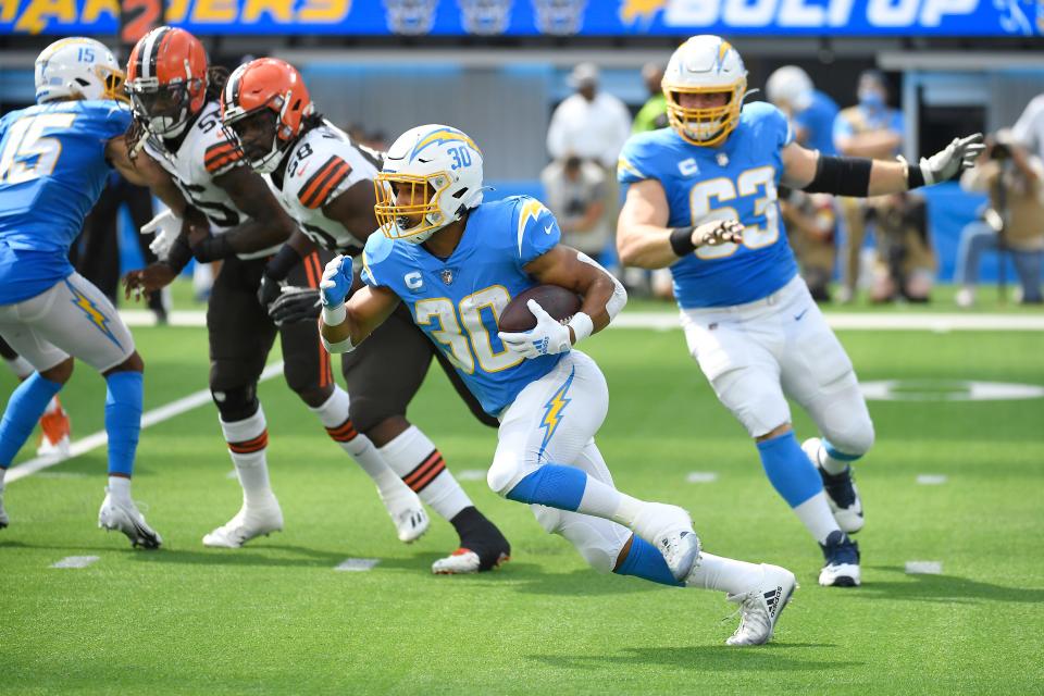 Los Angeles Chargers running back Austin Ekeler (30) carries against the Cleveland Browns during the first half of an NFL football game Sunday, Oct. 10, 2021, in Inglewood, Calif. (AP Photo/Kevork Djansezian)