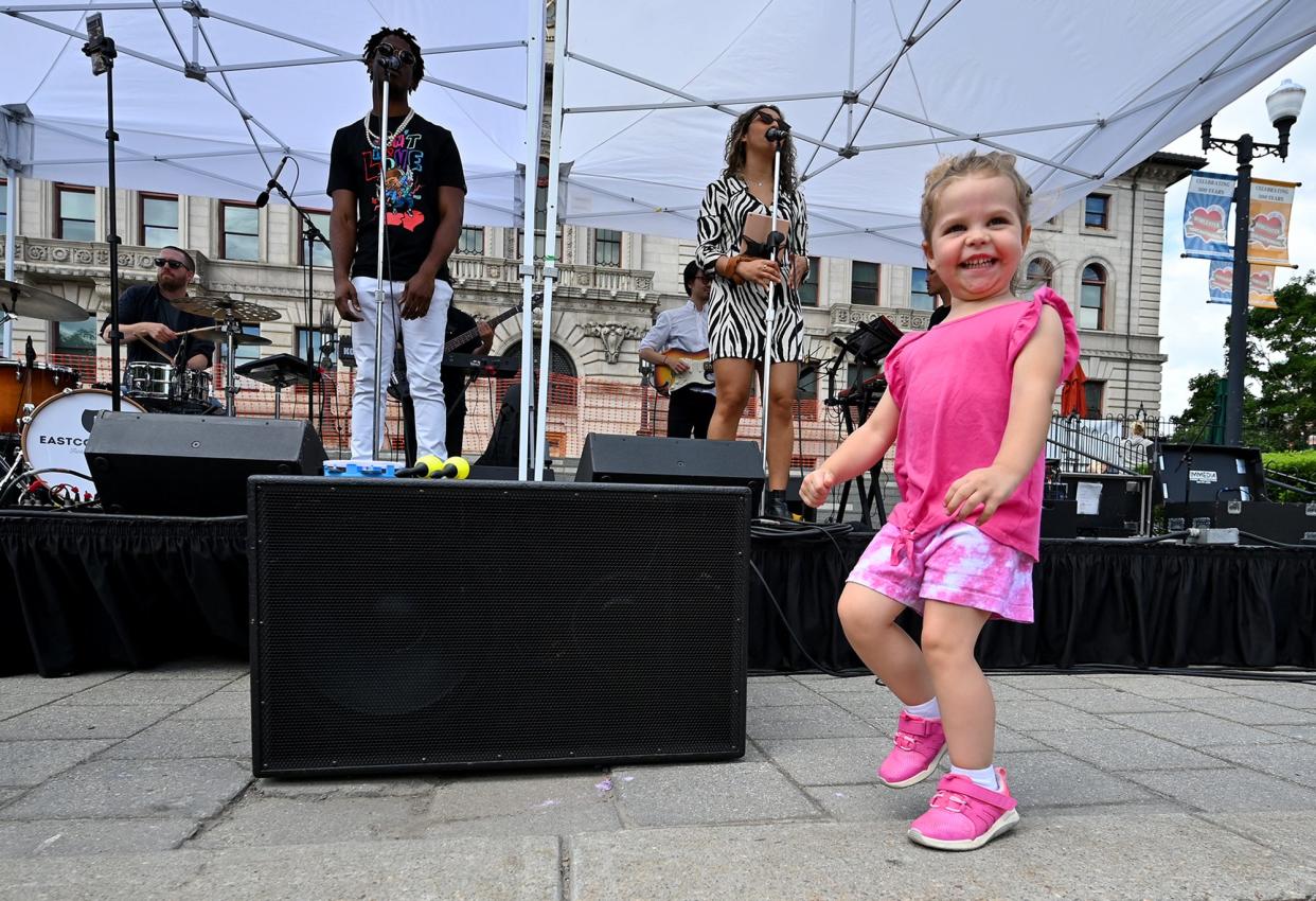 Alice Terlizzi, 3½, of Worcester, dances to East Coast Soul as they perform Thursday during the Out To Lunch Festival and Farmers Market on the Worcester Common Oval.